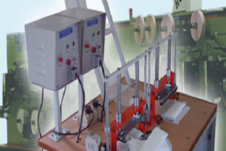 Low cost sanitary napkin making machine